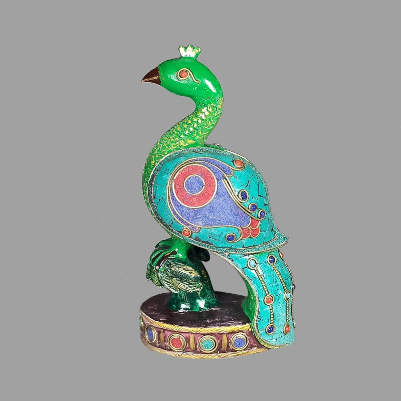 Stone inlaid peacock,facing left